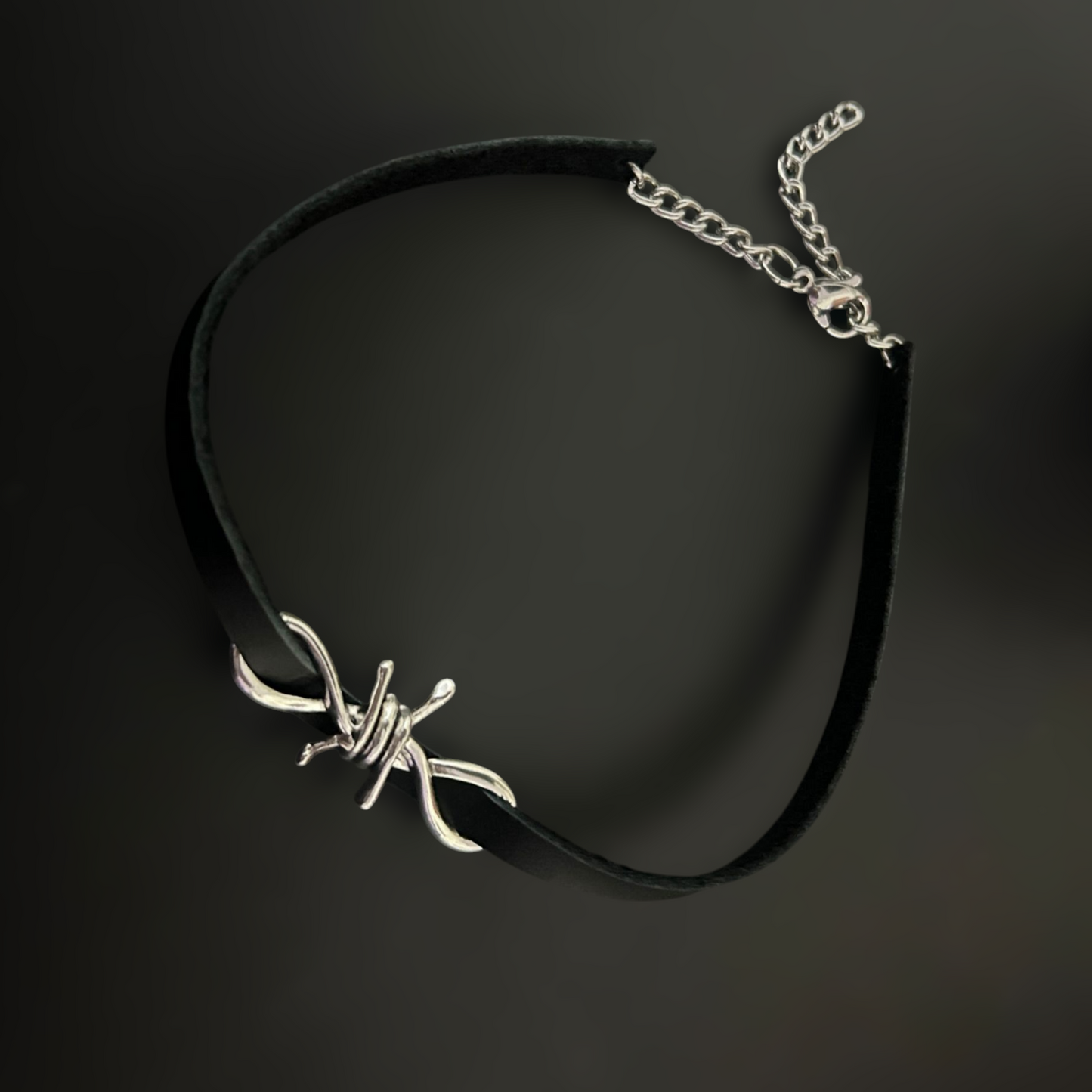 Y2K Industrial Grunge Choker - flat display. Feat. barbed wire motif, organic leather, and anti-tarnish curb chain. Alt and gothic necklaces for men and women.