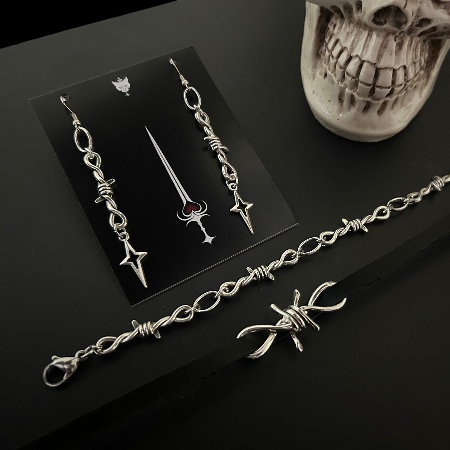 Combo of barbed Snare Gothic Bracelet, Leather Choker and Barbed Twilight Star Earrings. Shop alt and grunge jewelry and accessories online in India. Perfect for cosplay and y2k styling