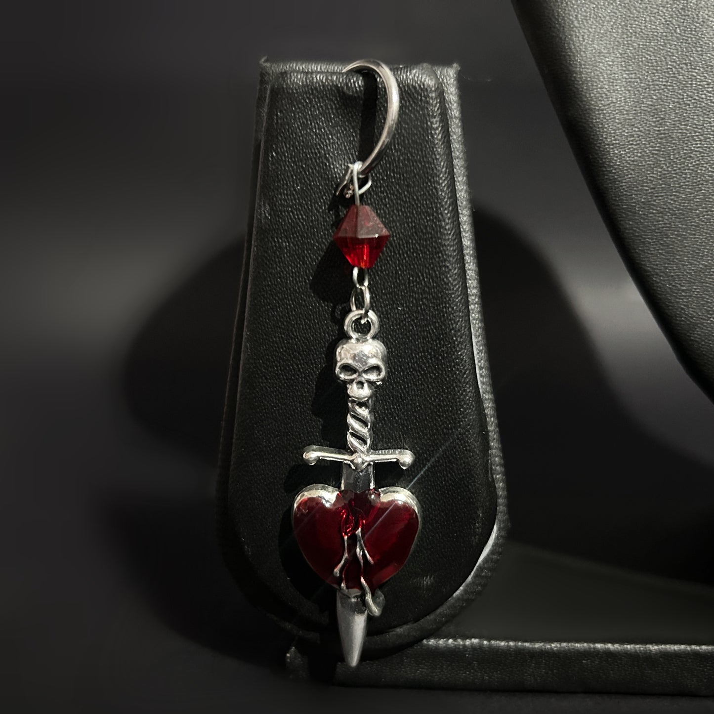 Lone Crimson Heart Dagger Earring - Skull motif chrome plated accessories for gothic styling. Pair with mesh, tall boots and leather for an altcore look