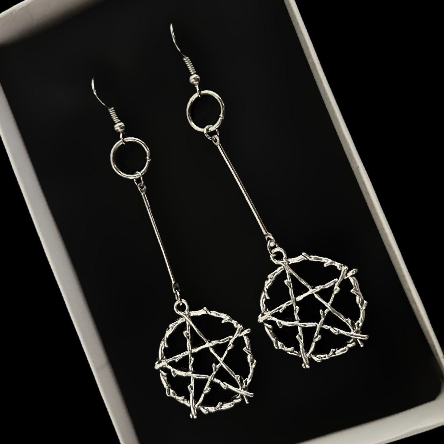 Occult-inspired pentagram earrings with bone finish and long gothic drops. Daedra-themed alt jewelry for fantasy lovers and witch aesthetics. India shop.