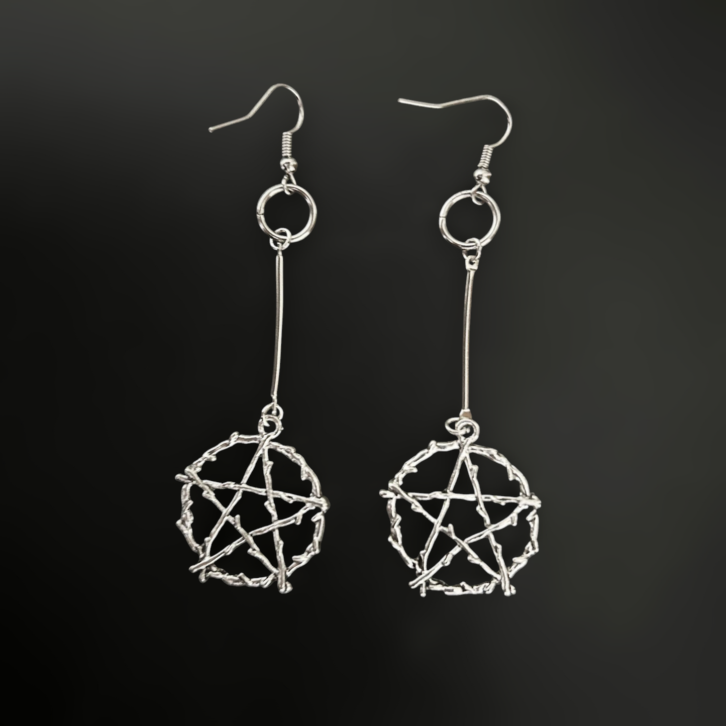 Gothic drop earrings with silver pentagram design, inspired by Daedric relics. Alt accessories for witches, y2k grunge and cosplay fashion enthusiasts, and gamers.