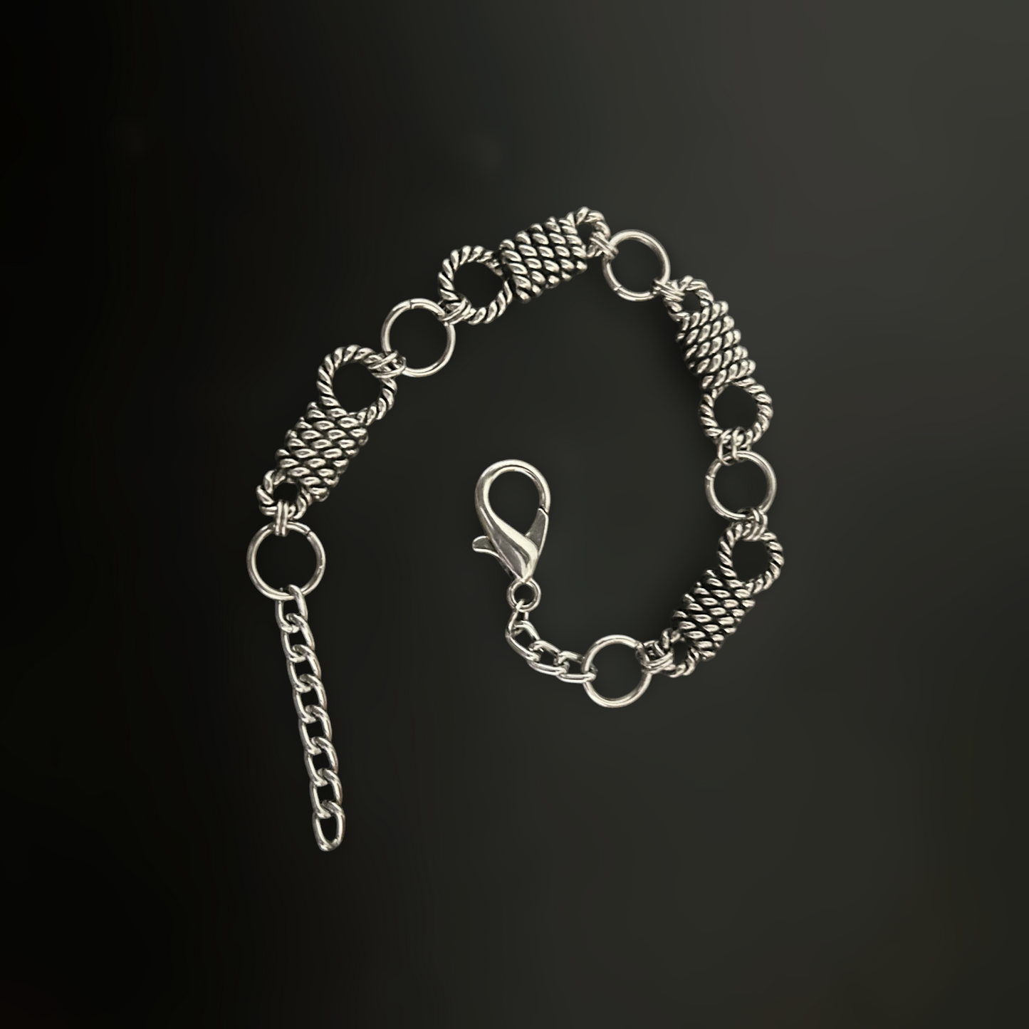 Silver gothic bracelet with twisted rope links, alt jewelry for rockstar, y2k, k-pop, and anime cosplay street style for gothic and grunge fashion lovers across India