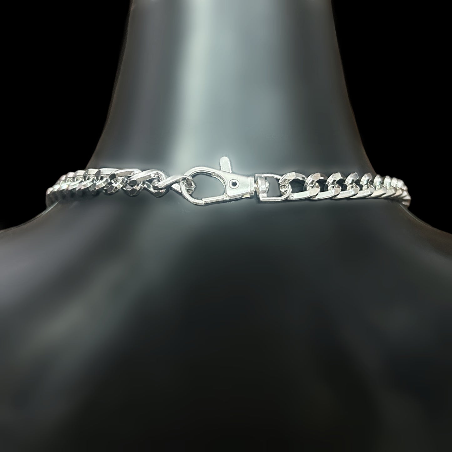 Close-up of clasp on silver Obsidian Veil Body Harness. Tarnish-free gothic accessory for alternative fashion. Shop affordable body jewelry in India.