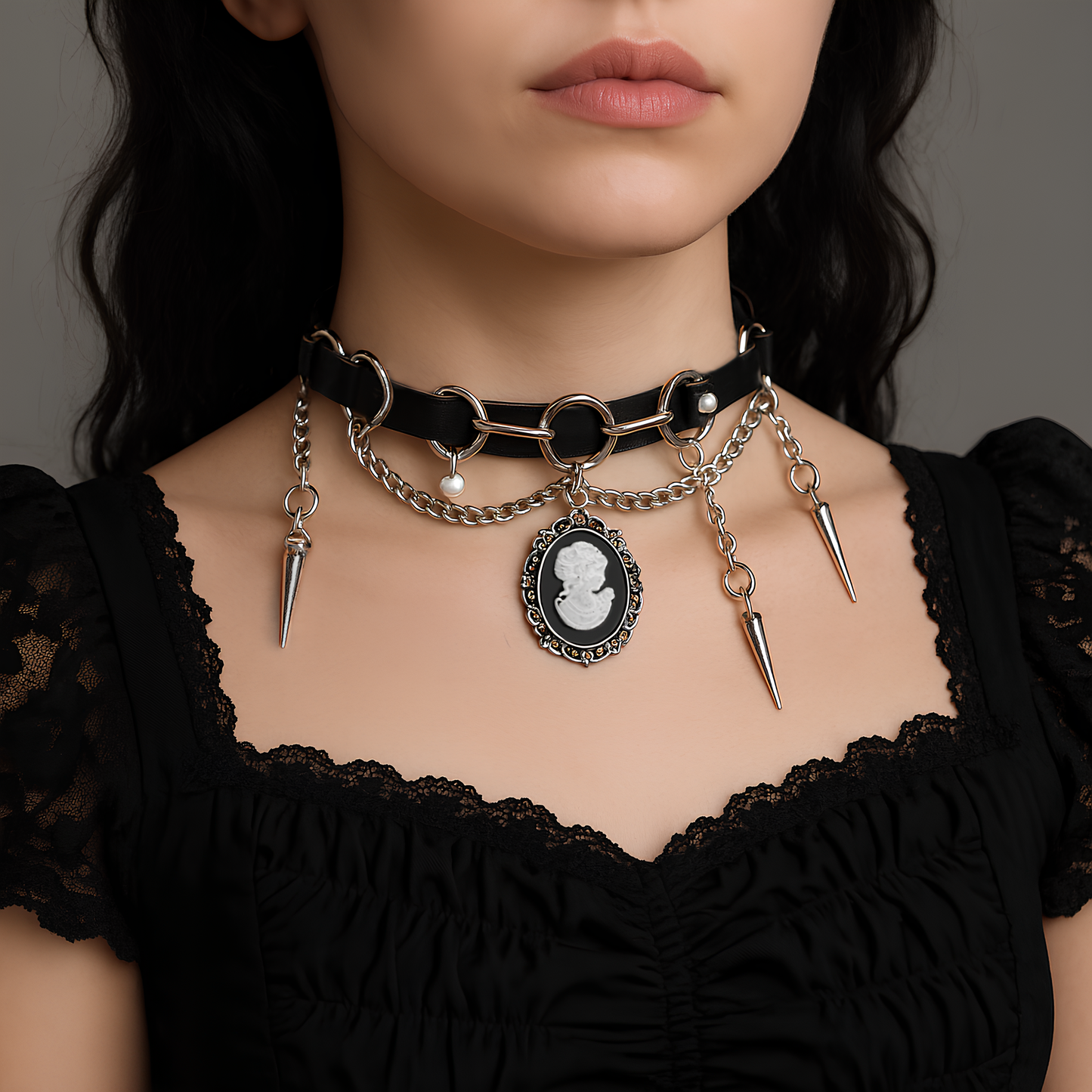 Model wearing Victorian Gothic Choker feat. authentic leather, stainless steel curb chain, pearl drops and spike charms. Alt jewelry styled for grunge and dark fashion looks in India.