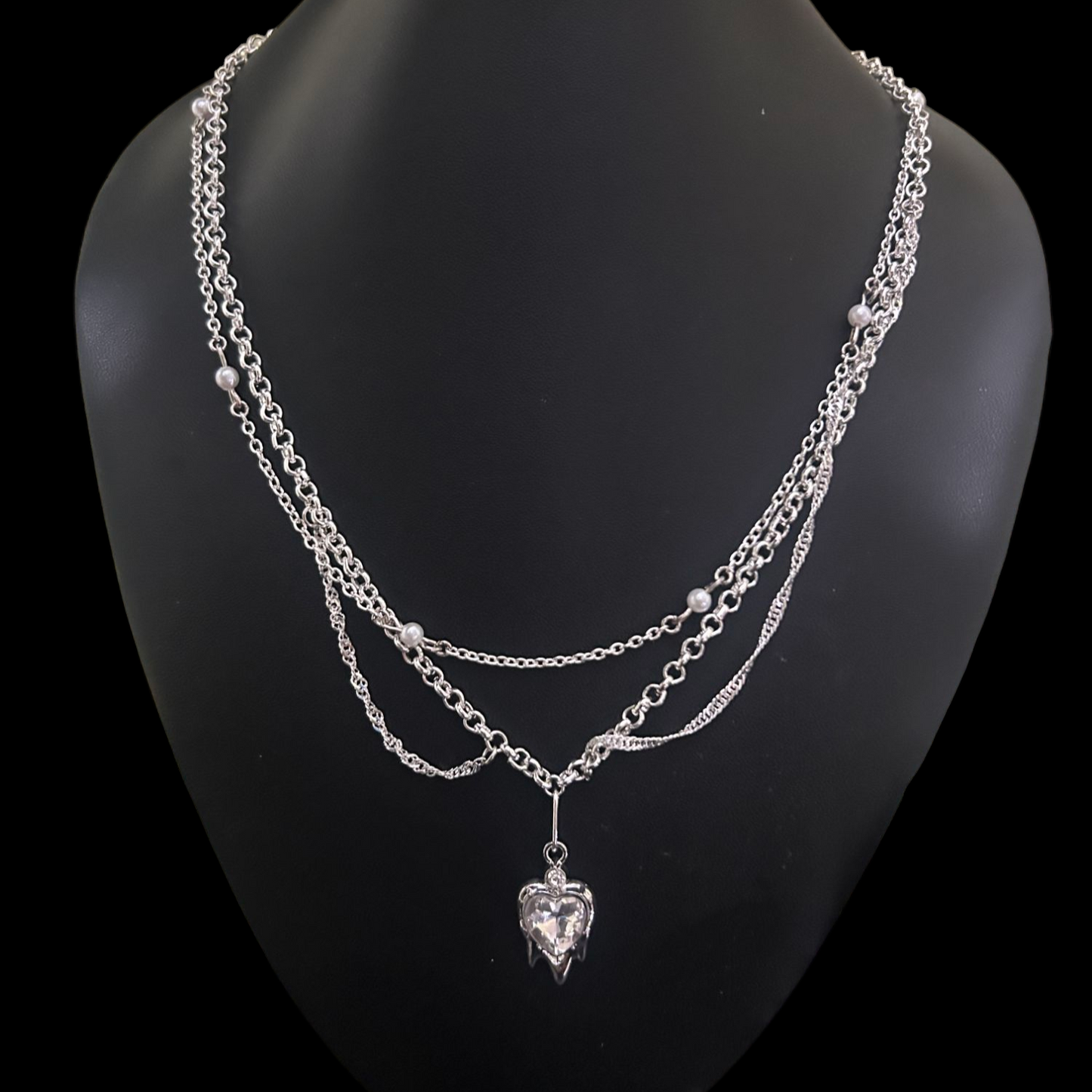 Iced heart grunge layered necklace by Phantom Cat. Shop Y2K and Kpop fashion jewelry online for everyday alt wear. Beaded layered pearl chains - perfect for grunge styling and cosplay