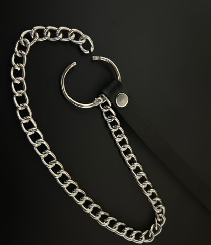 Angled flat lay of Phantom Cat grunge bracelet with black leather strap and silver chain accents — gothic alt jewelry India, styled for streetwear, rockstar, and anime cosplay aesthetics. Ideal for edgy layered looks and alt street fashion.