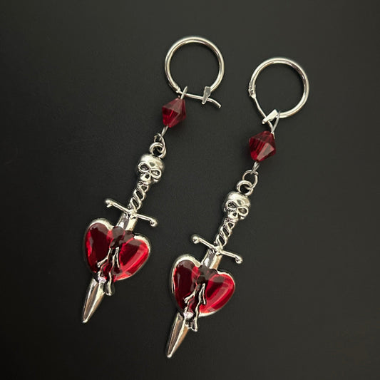 Gothic Skull Dagger Heart Earrings by Phantom Cat India - Feat. stainless Steel hoops and red crystal beads. Alt and grunge accessories for lovers of vintage fashion and anime cosplay alike. 