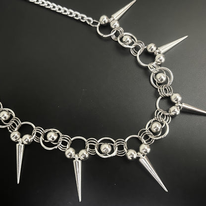 Front view of Iron Thorn Chainmaille Choker by Phantom Cat India feat. silver spikes and bead-ring clusters. Gothic and alt fashion jewelry with chainmaille construction and punk-inspired design.