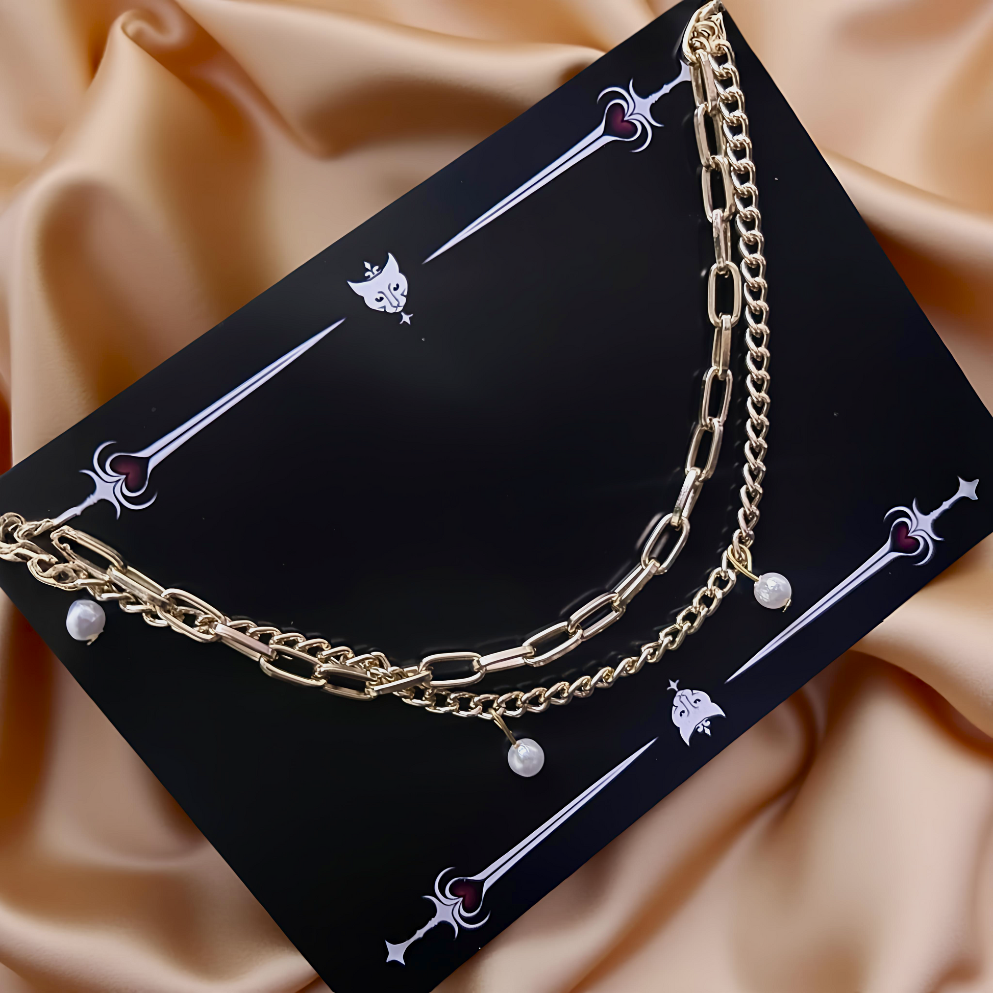 Layered aluminium gold necklace on Phantom Cat Jewelry Card - shop gothic and alt accessories online. light-weight, grunge and perfect for lovers of unhinged fashion 
