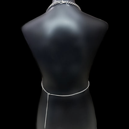 Back view of Obsidian Veil body harness by Phantom Cat. Minimal gothic chain detail at waist for grunge and alt style.