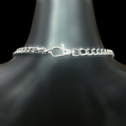 Close-up of clasp on silver Obsidian Veil Body Harness. Tarnish-free gothic accessory for alternative fashion. Shop affordable body jewelry in India. 