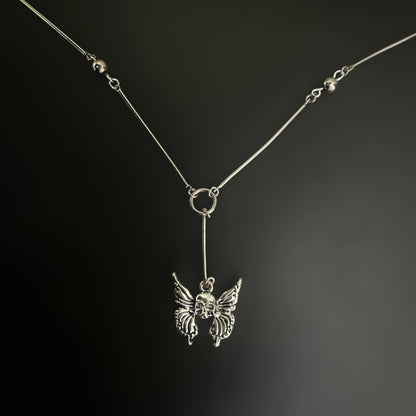 Skull Wing Bones Y Drop Gothic Necklace by Phantom Cat India. Gothic, alt fashion accessory with Y2K and fantasy elements.