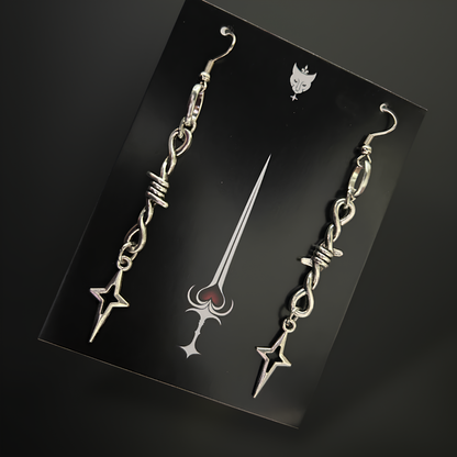 Gothic barbed wire nova star motifs earrings by Phantom Cat India. Grunge and alt accessories for women - perfect for y2k styling and anime cosplay